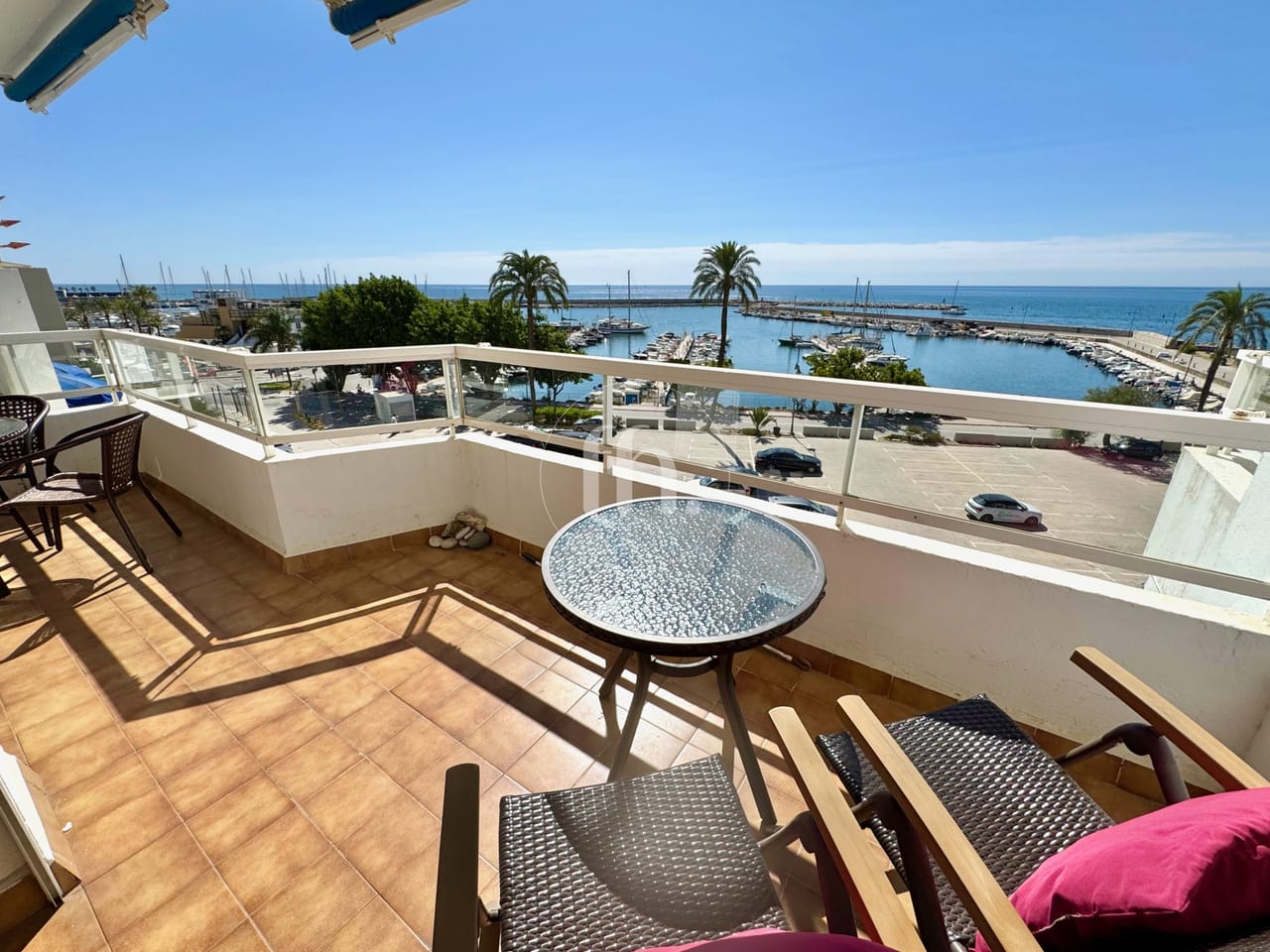 Frontline apartment in Estepona port with panoramic sea views