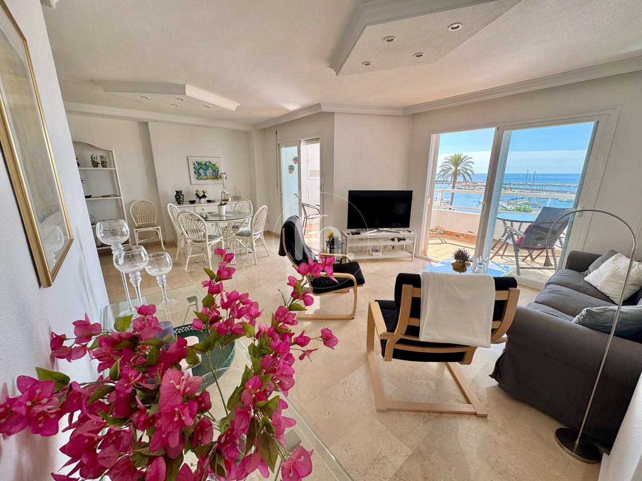Frontline apartment in Estepona port with panoramic sea views — alternate view